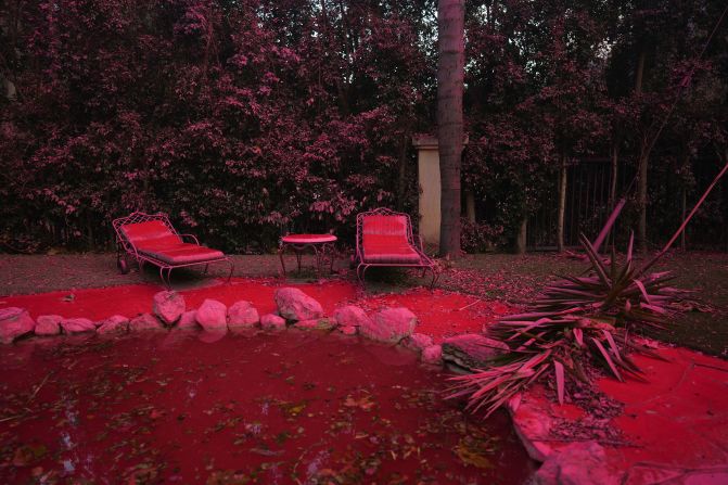 Fire retardant covers the backyard of a home in Mandeville Canyon.