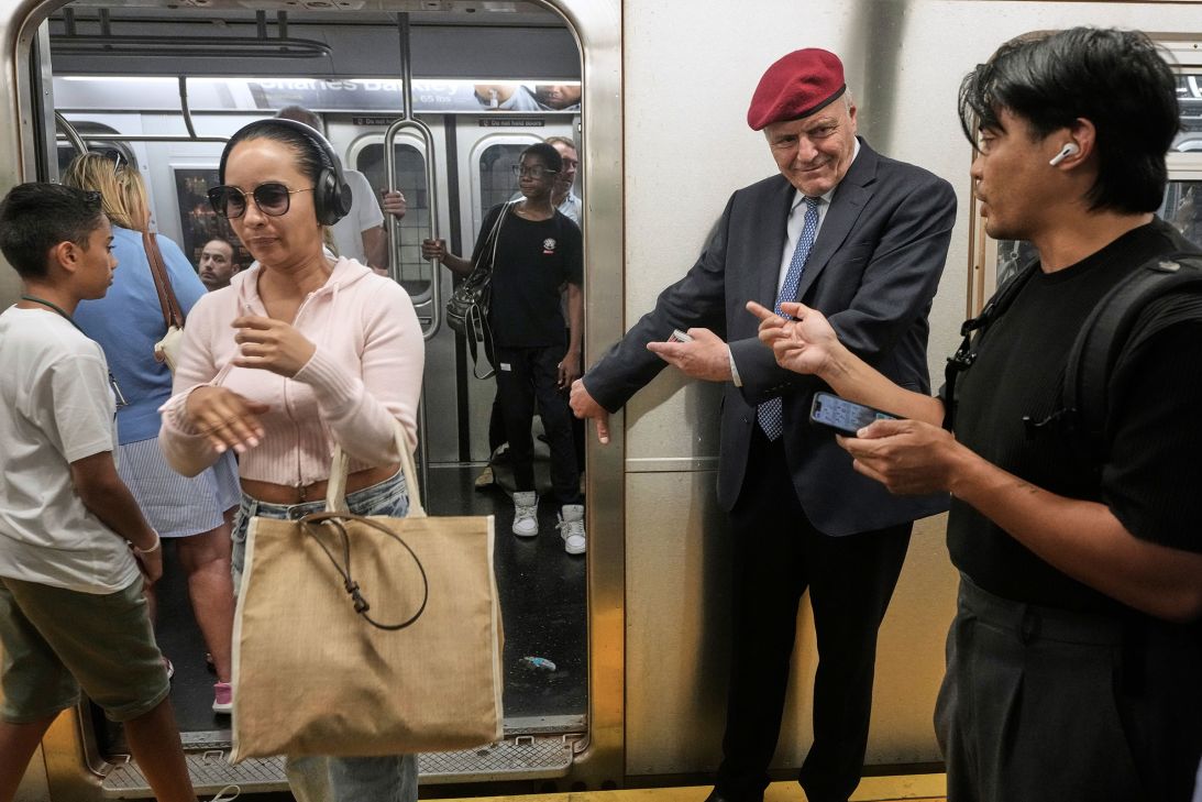 Curtis Sliwa campaigning on the subway