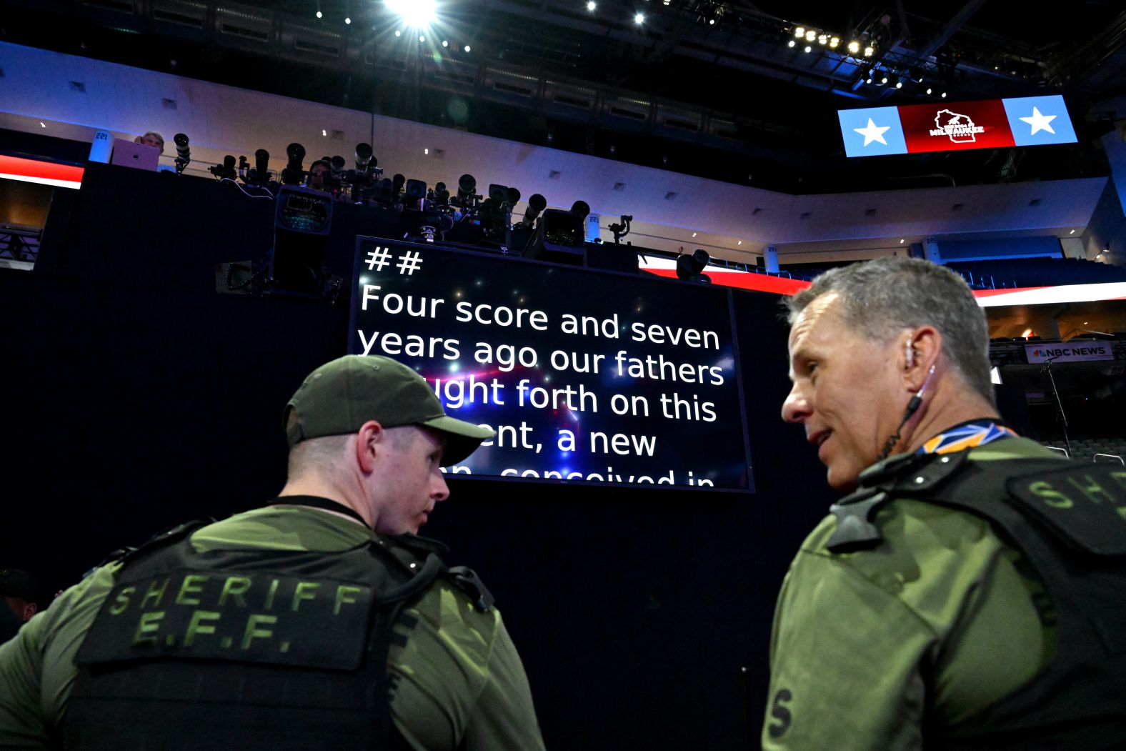 Security personnel survey the convention floor on Sunday.