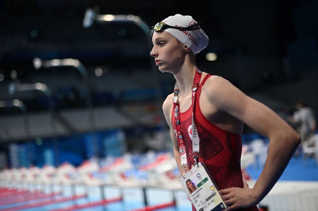 Canada's Summer McIntosh reacts after competing in a semi-final of the women's 200m freestyle swimming event during the Tokyo 2020 Olympic Games.