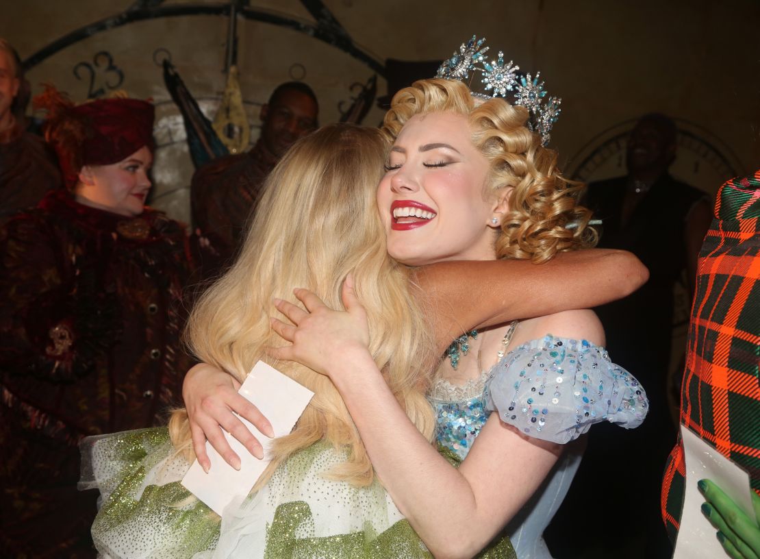 Kristin Chenoweth hugs McKenzie Kurtz (right) backstage at the "Wicked on Broadway 20th Anniversary Celebration" in October 2023.