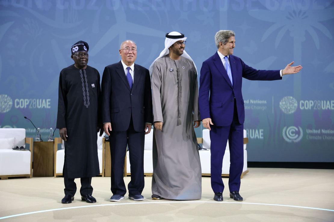 From left, Bola Tinubu, Nigeria's president; Xie Zhenhua, China's special envoy for climate change; COP28 President Sultan Al Jaber; and John Kerry, US special presidential envoy for climate, on Saturday at the climate summit in Expo City in Dubai.
