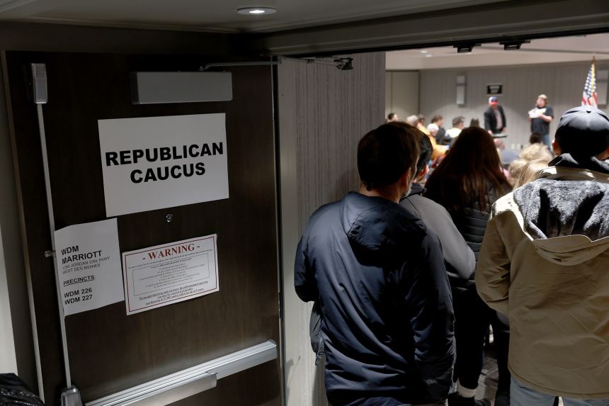 A crowd attends their Republican caucus on January 15, 2024, in West Des Moines, Iowa.