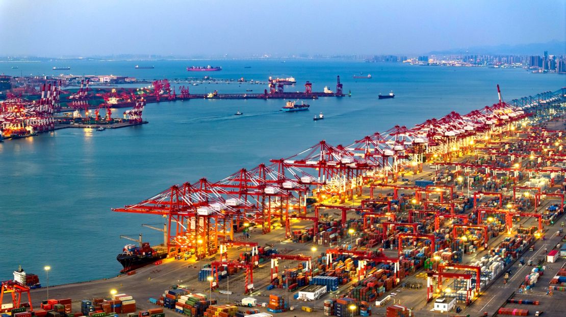 A container ship is loaded at a terminal in northeastern China's Qingdao Port earlier this month.