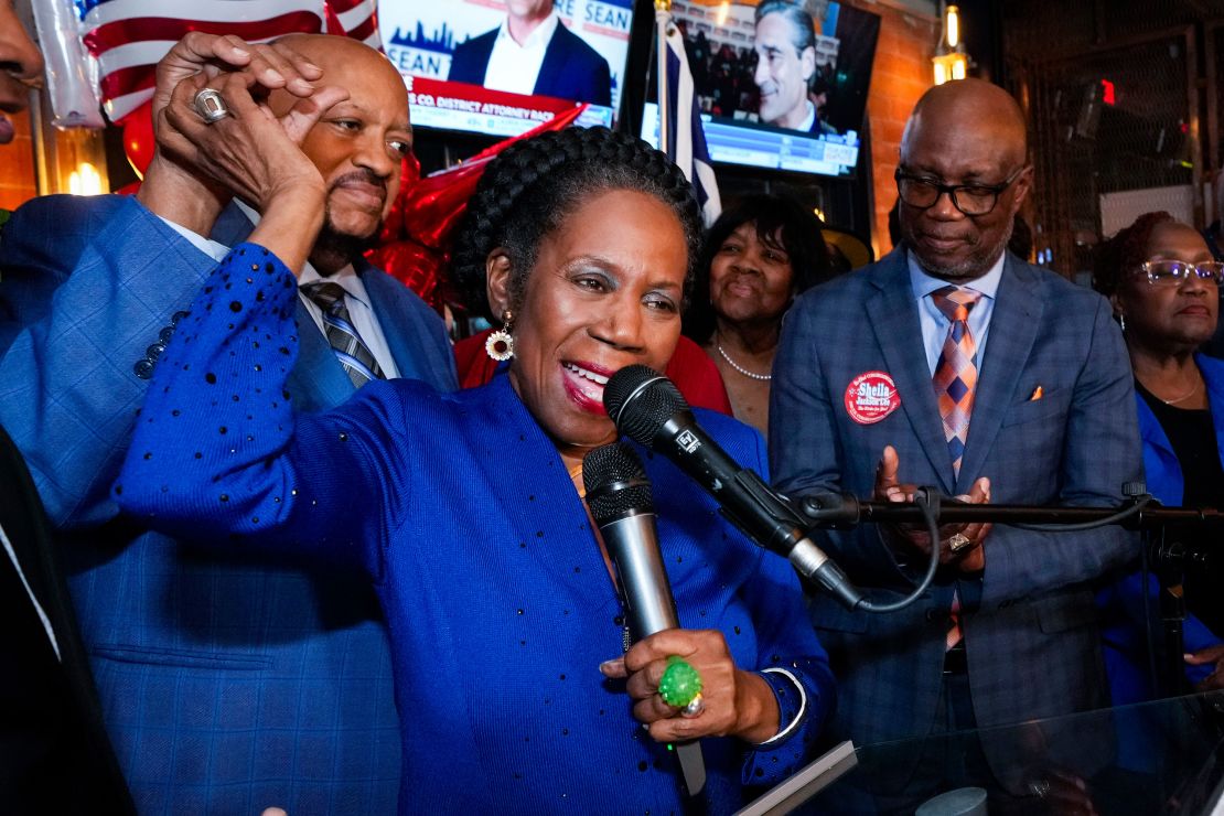 Rep. Sheila Jackson Lee, D-Texas, reaches back to hold her husband, Elwyn Lees, hand, as she speaks to her supporters during her election night watch party on Tuesday, March 5, 2024 in Houston.