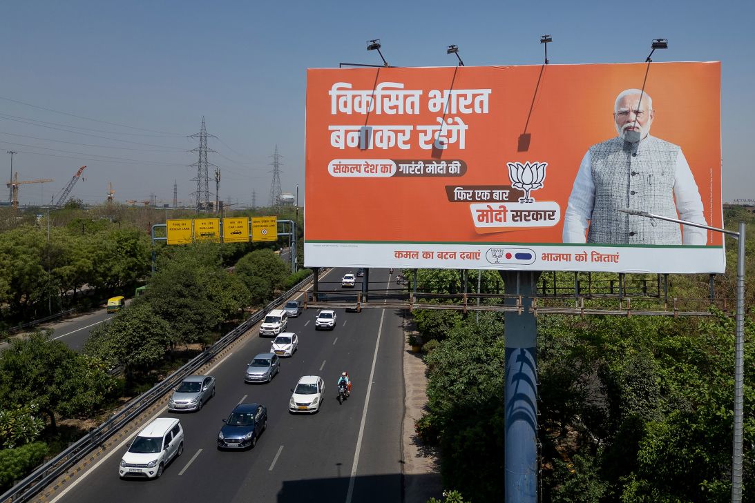 Prime Minister Narendra Modi<em> </em>appears on a Hindi-language billboard advertising the BJP in Noida, Uttar Pradesh, India, in April 2024.