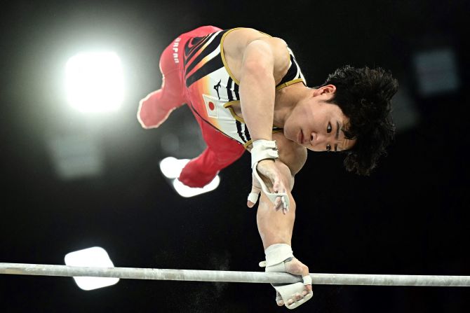 Japanese gymnast Shinnosuke Oka competes on the horizontal bar during the individual all-around on July 31. <a >Oka went on to win the gold</a>. Japanese men have now won the individual all-around in four straight Olympics. Daiki Hashimoto won three years ago in Tokyo, and Kohei Uchimura won in 2016 and 2012.