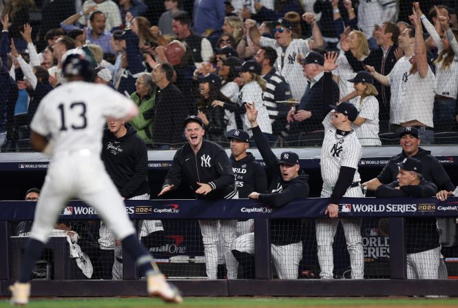 The Yankees celebrate in the dugout after Jazz Chisholm Jr. hit a solo home run in the first inning to put the Yankees up 3-0. It came right after Judge hit a two-run blast.