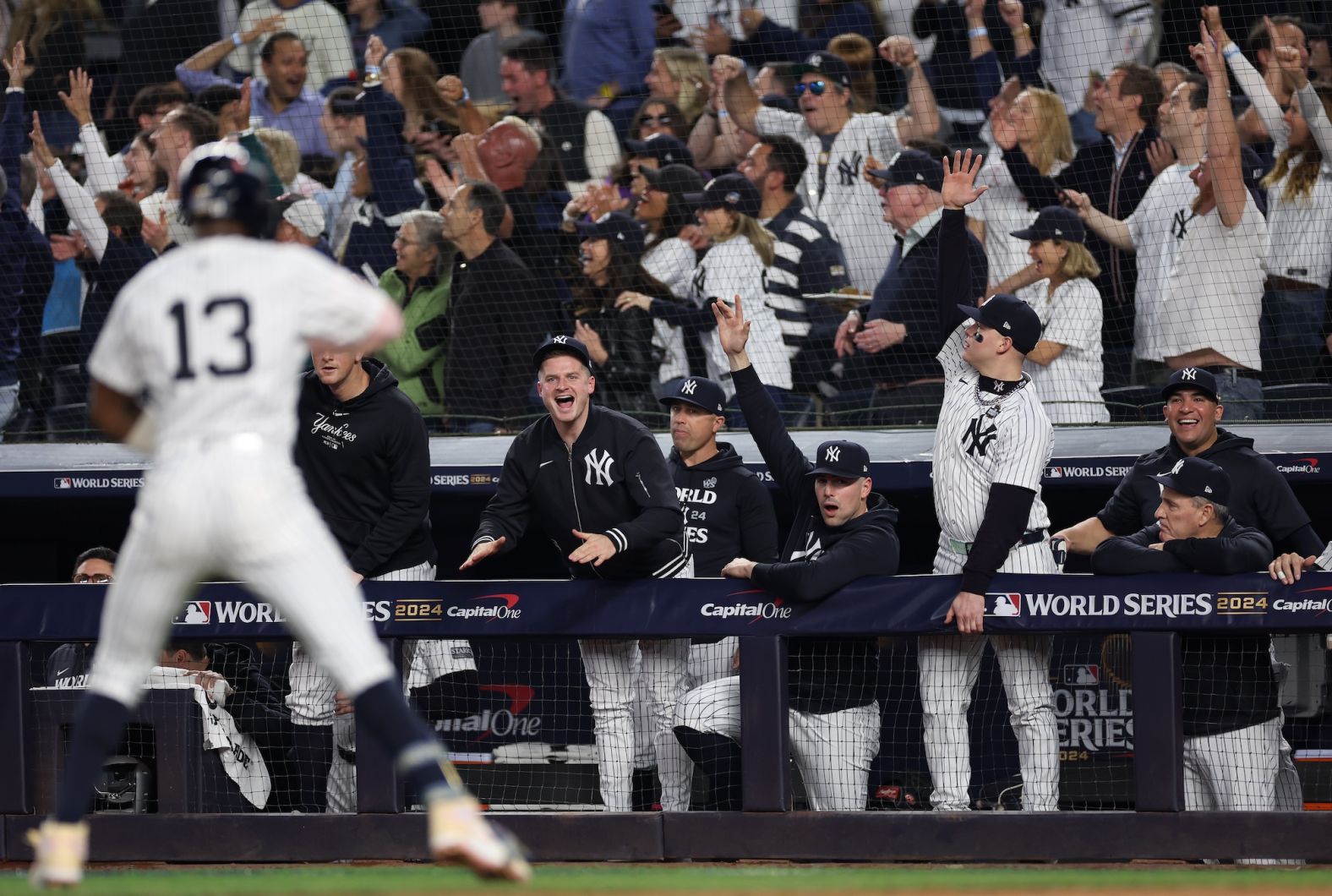 The Yankees celebrate in the dugout after Jazz Chisholm Jr. hit a solo home run in the first inning to put the Yankees up 3-0. It came right after Judge hit a two-run blast.