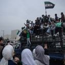 DAMASCUS, SYRIA - DECEMBER 11: People gather to celebrate in Umayyad Square on December 11, 2024 in Damascus, Syria. Rebel forces in Syria have retaken the capital from longtime ruler Bashar al-Assad, who has fled the country for Moscow. The fall of the Assad regime marks a new chapter for Syria, which has been mired in a multi-party civil war since 2011, sparked by the Arab Spring uprisings. (Photo by Chris McGrath/Getty Images)