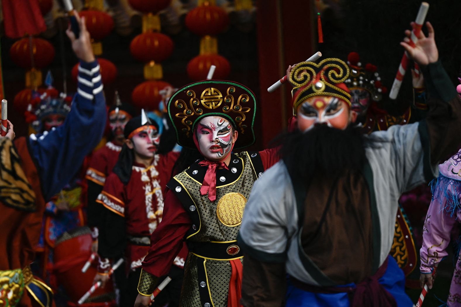 Folk dancers perform at the Ditan Park Temple Fair in Beijing, China, on Wednesday.
