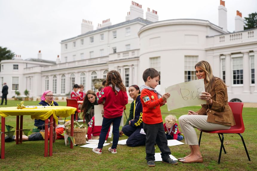 US first lady Melania Trump and Catherine, Princess of Wales speak with members of the Scouts' Squirrels program in the grounds of Frogmore Cottage in Windsor, England, on September 18, 2025.