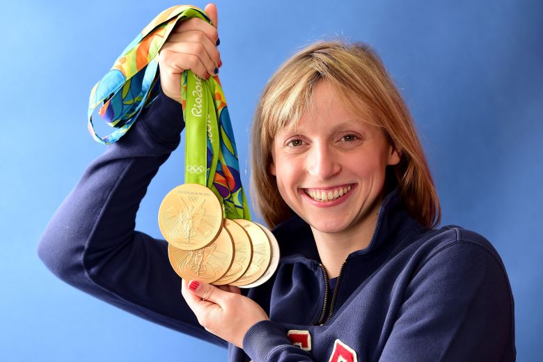 Ledecky poses for a photo with her five Olympic medals in Rio de Janeiro in August 2016.