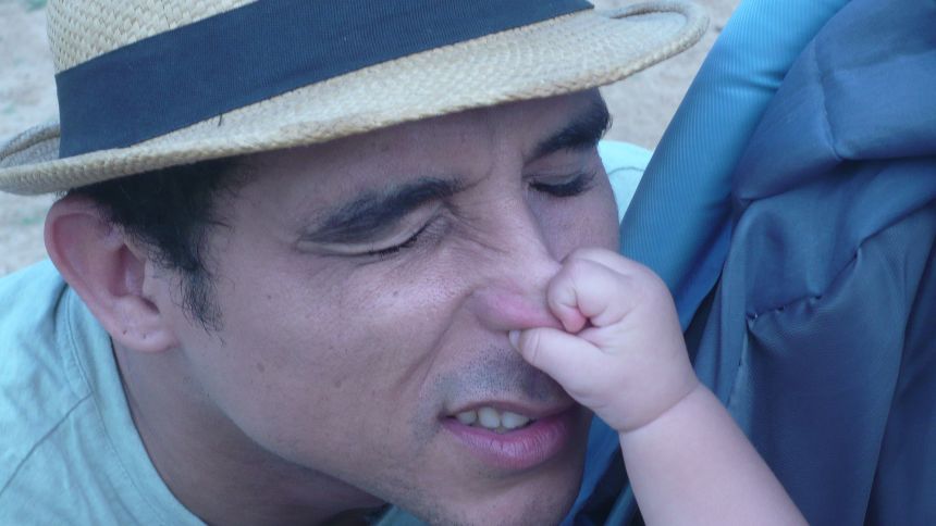 Altunaga, with his son, just before leaving Cuba for the US.