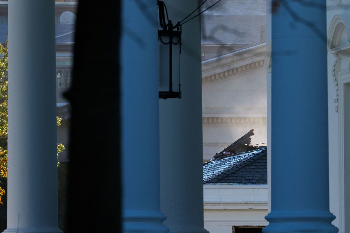 Debris is visible as crews demolish the facade of the East Wing on October 22.