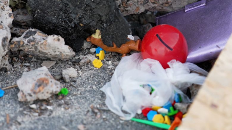 Toys were left flipped onto the roof of the apartment building following the strike. 