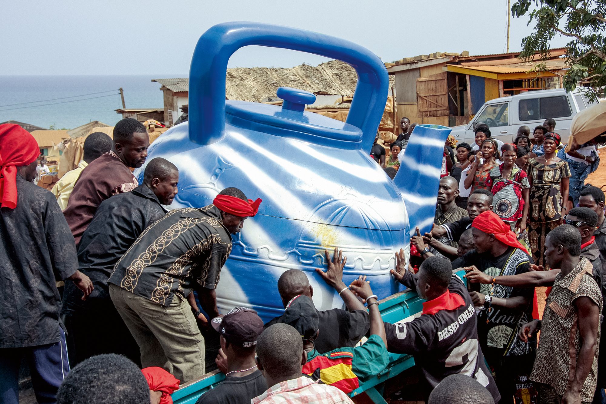 A traditional priest and fisherman was buried inside a giant blue teapot in Ghana’s Central Region in 2009.