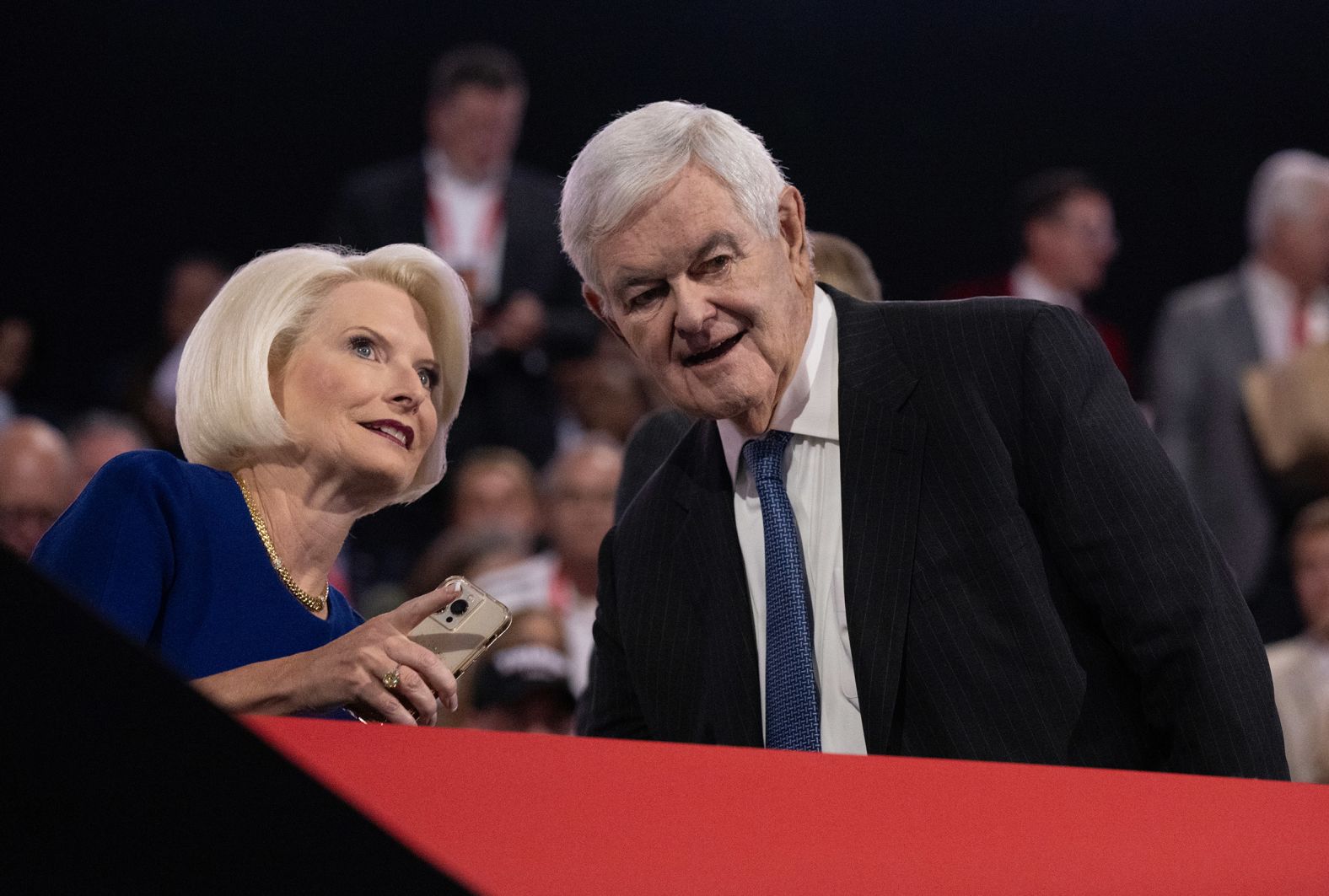 Former House Speaker Newt Gingrich attends the convention Wednesday with his wife, Callista.