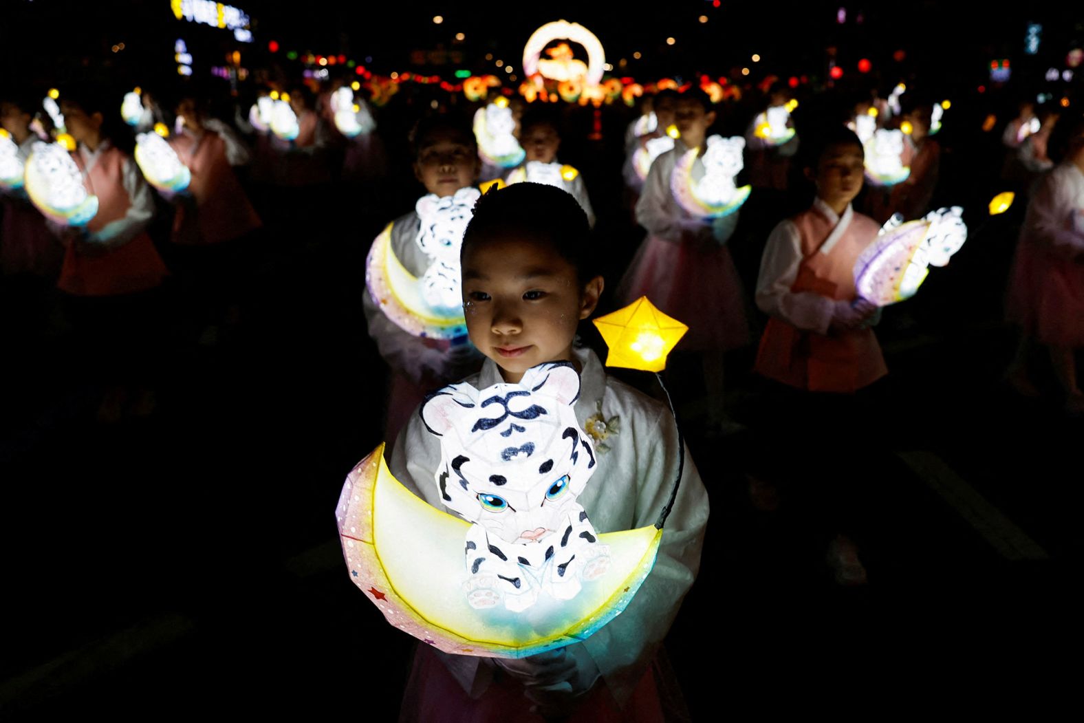 Children in Seoul, South Korea, march with lanterns Saturday, April 26, during a Lotus Lantern parade celebrating Buddha’s upcoming birthday.