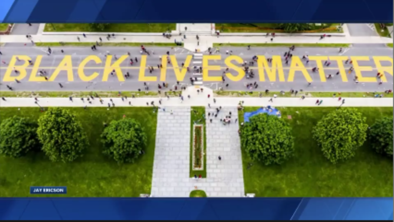 Volunteers painted "Black Lives Matter" in front of the Vermont statehouse Saturday.