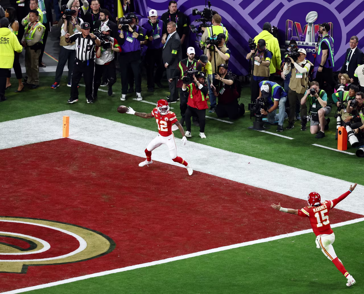 Mecole Hardman Jr. of the Kansas City Chiefs celebrates with Patrick Mahomes after scoring the game-winning touchdown in overtime.