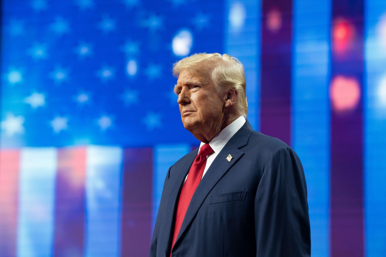 Former President Donald Trump takes the stage at a campaign rally in Glendale, Arizona, on August 23. 