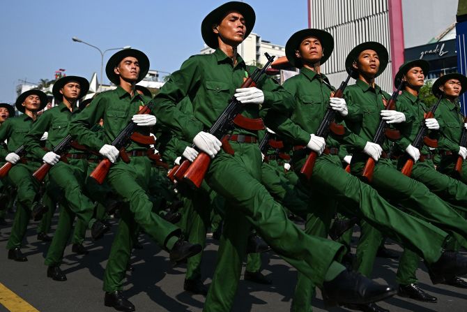 Soldiers in Ho Chi Minh City, Vietnam, march during a parade marking the 50th anniversary of the end of the Vietnam War on Wednesday, April 30.