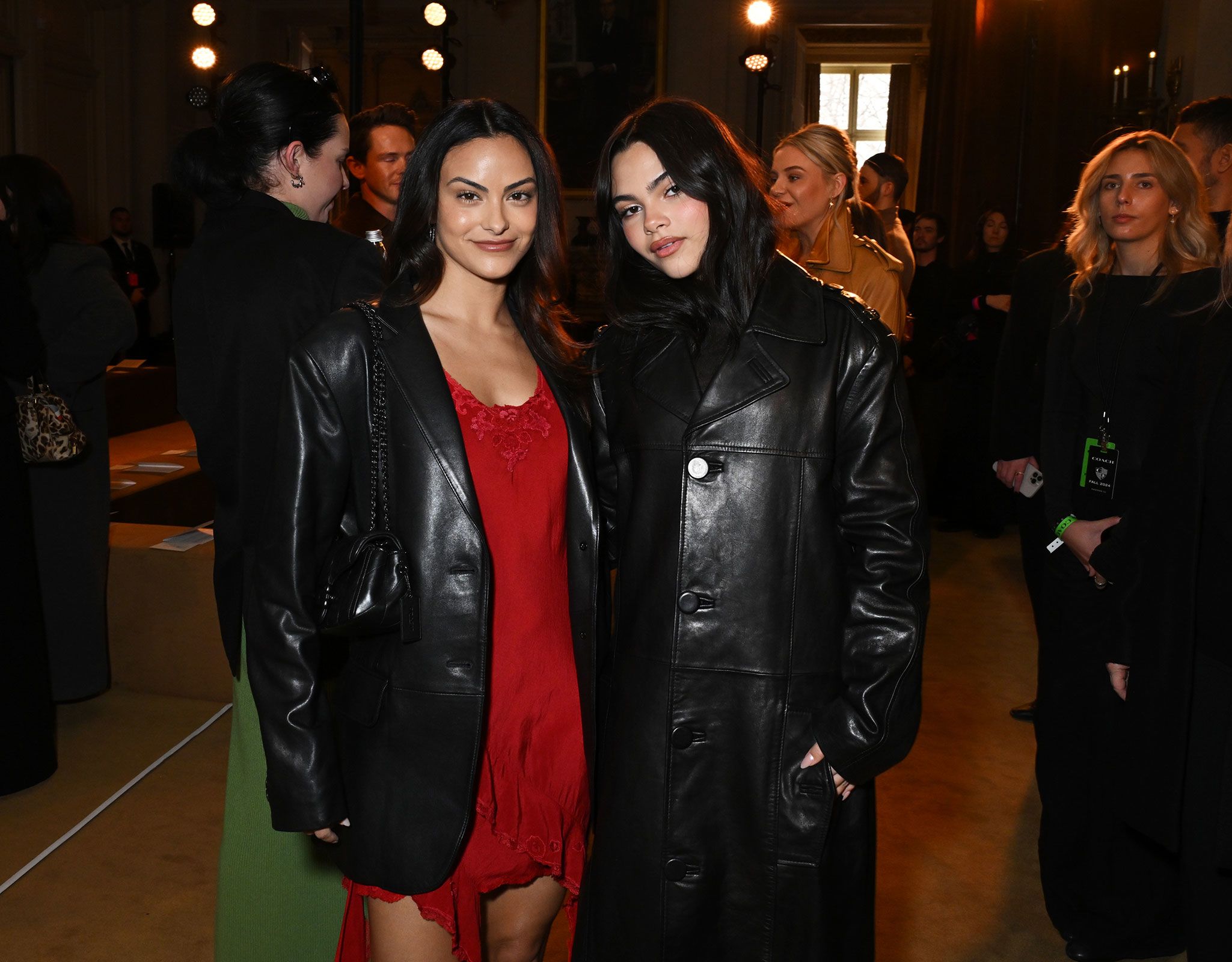 Camila Mendes and Ariana Greenblatt at the Coach runway show on Monday.