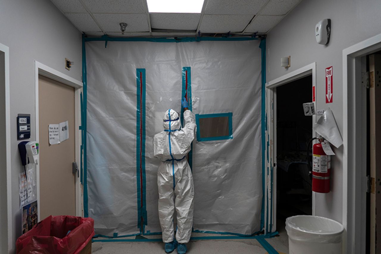 A medical staff exits the COVID-19 intensive care unit (ICU) at the United Memorial Medical Center on January 1, 2021 in Houston, Texas.