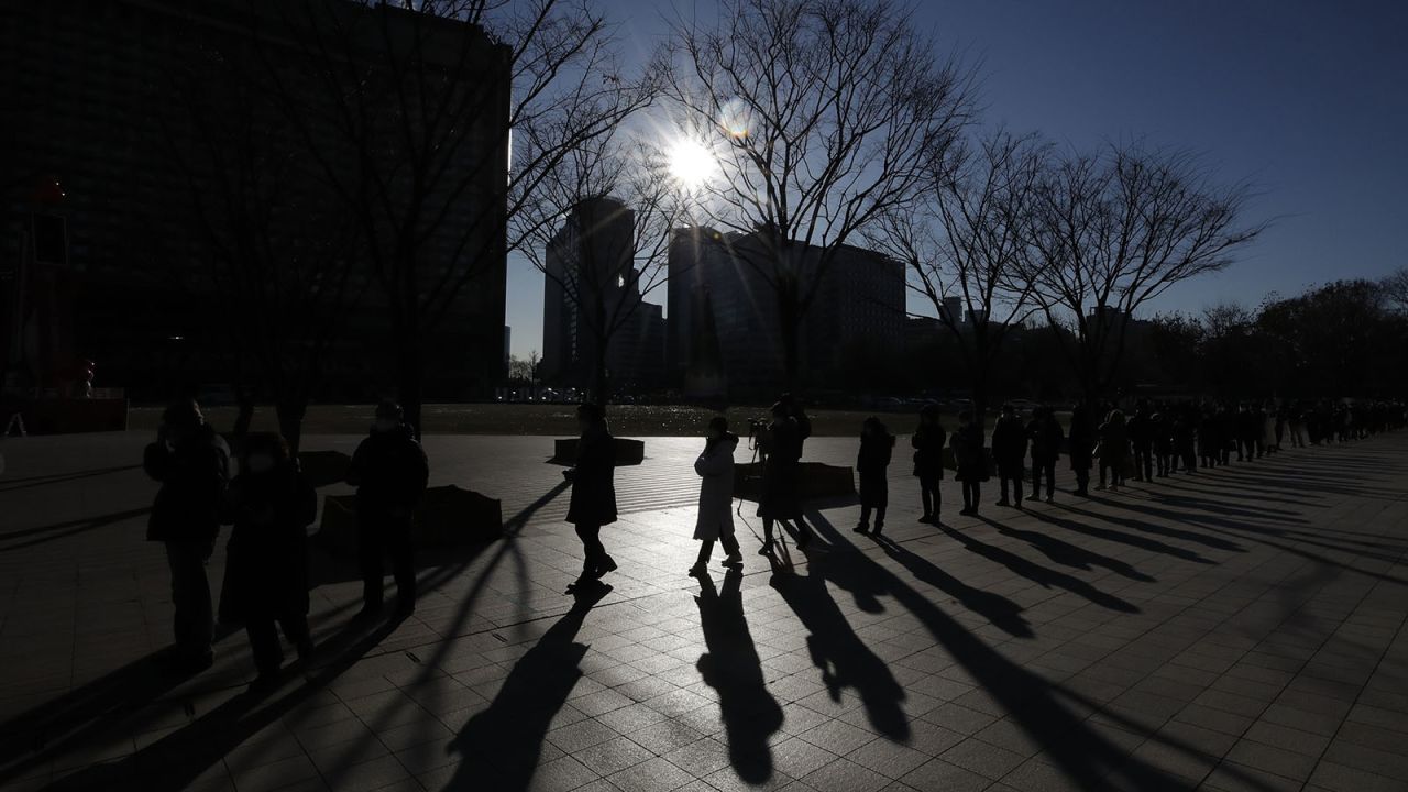 People queue in line to wait for coronavirus testing in Seoul, South Korea, on Thursday, December 17.