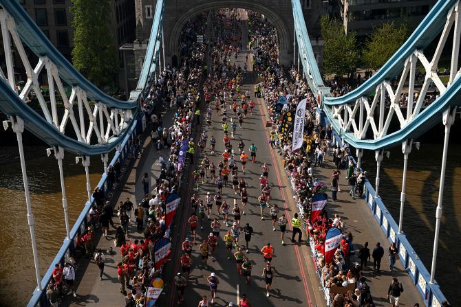 People run on London’s Tower Bridge during the London Marathon on Sunday, April 27.