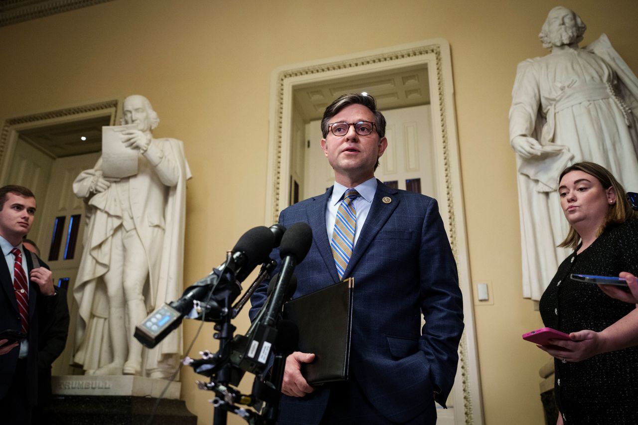 House Speaker Mike Johnson gives a statement to reporters about the mass shooting in Lewiston at the US Capitol in Washington, DC, on Thursday. 