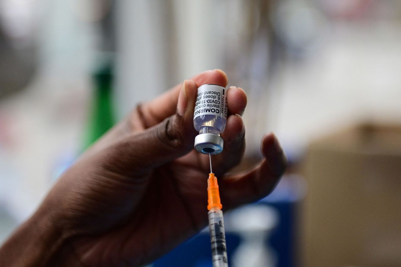 A nurse prepares a shot of BioNTech Comirnaty vaccine on June 29 at Republique square in Paris. 