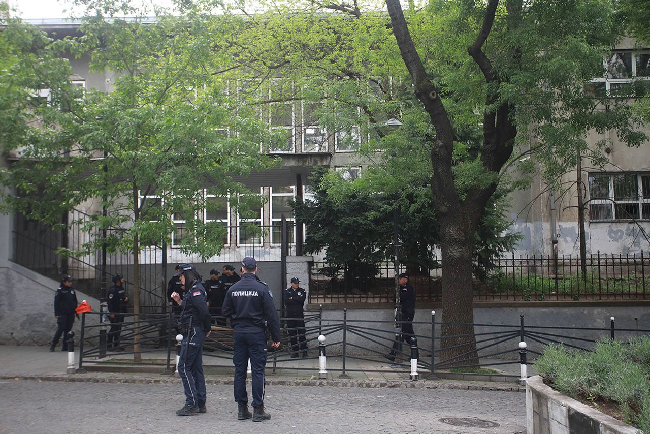 Police stand outside near Vladislav Ribnikar elementary school in Belgrade, Serbia, on May 3. 