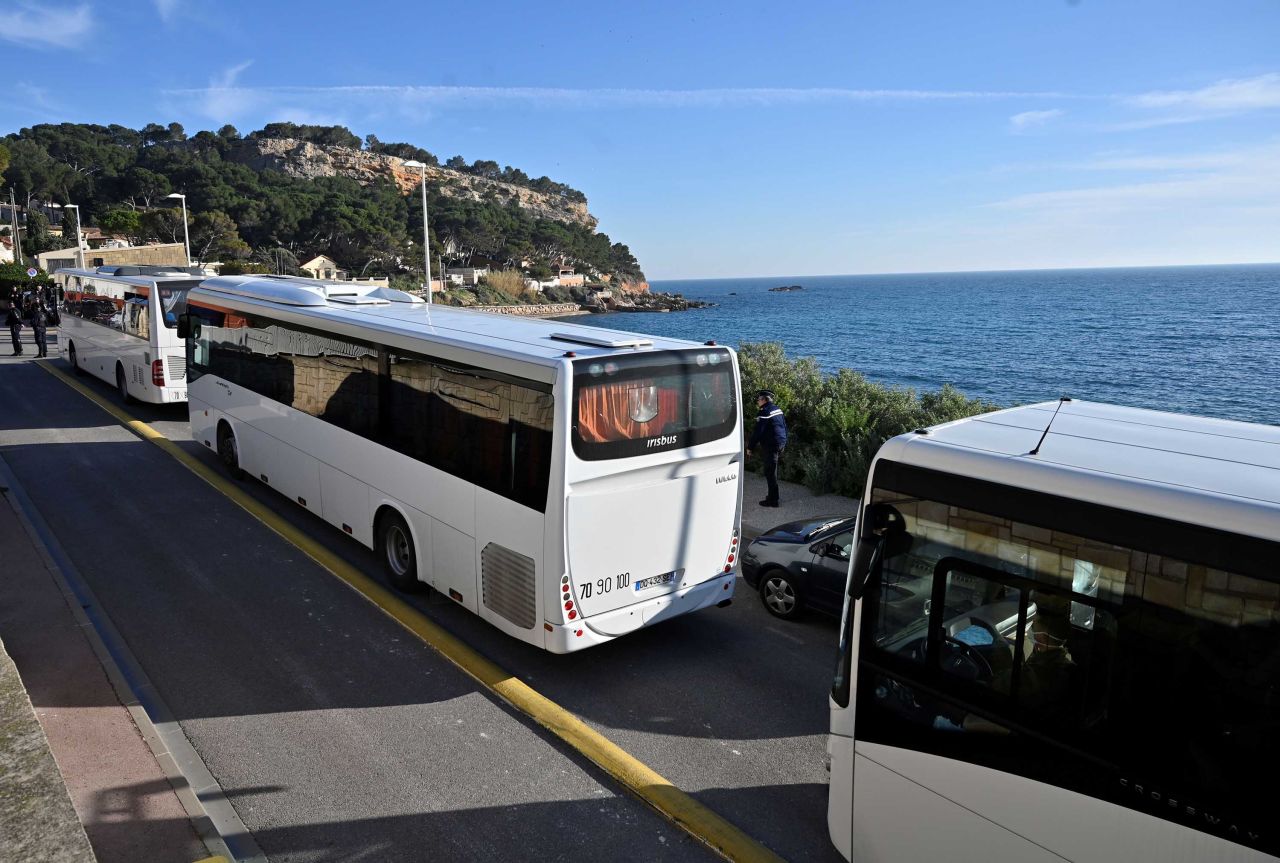 Buses believed to contain French citizens after their evacuation from the Chinese city of Wuhan arrive at the Vacanciel Holiday Resort in Carry-le-Rouet, near Marseille, France on Friday.