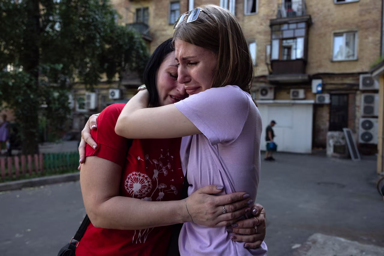 People react to the Russian missile strike in Chernihiv, Ukraine, on August 19. 