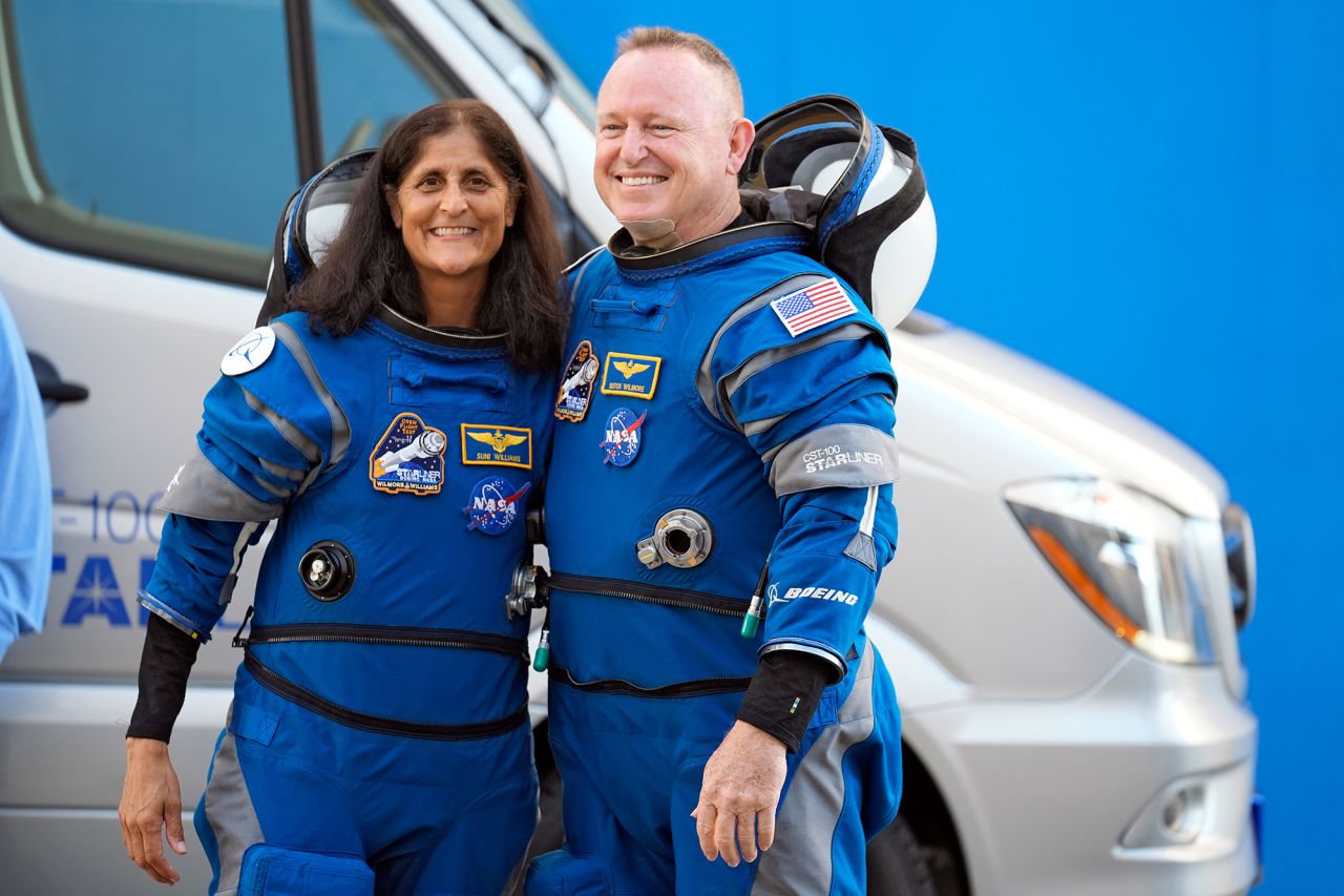 NASA astronauts Suni Williams, left, and Butch Wilmore pose for a photo after leaving the operations building for a trip to the launchpad at Space Launch Complex 41 in Cape Canaveral, Florida, on Wednesday. 