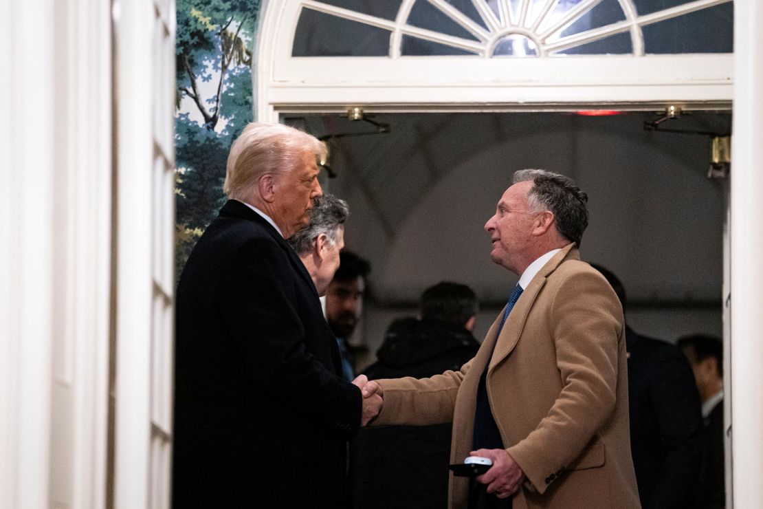 President Donald Trump shakes hands with Steve Witkoff as they as they welcome Marc Fogel back to the United States after being released from Russian custody at the White House on February 11 in Washington, DC. 