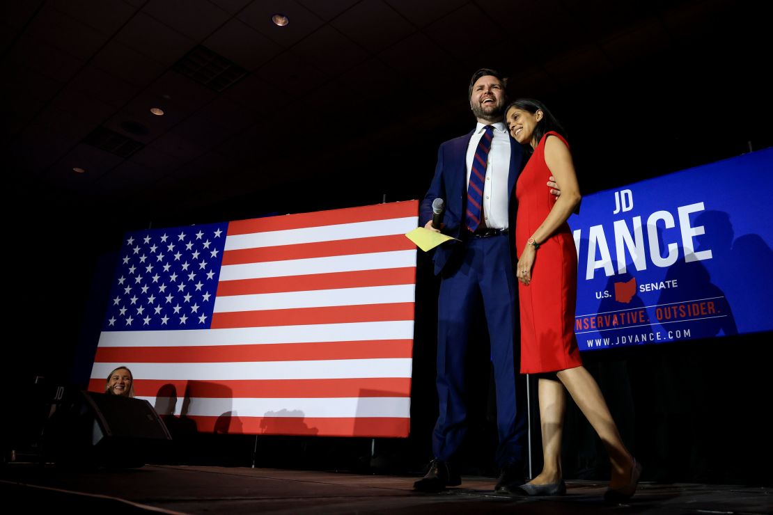 Republican Senate candidate JD Vance, left, hugs his wife Usha Vance, as he prepares to speak to supporters during an election night watch party on May 3, 2022, in Cincinnati.