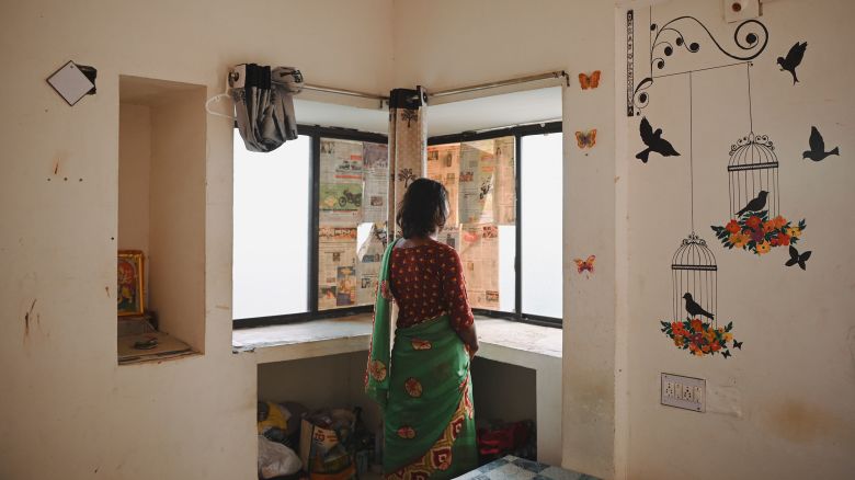 Mitali, a 25-year-old transgender woman and resident of Garima Greh, photographed in her room on 4th December, 2023. She works at a petrol pump in the neighborhood where she often faces societal obstacles.