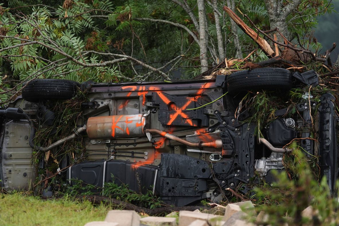 A vehicle is overturned in Kerrville on Friday.