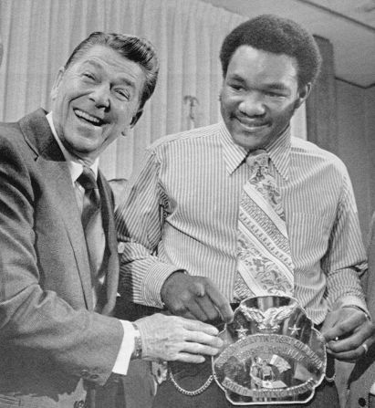 Foreman, with his new title belt, meets with then-California Gov. Ronald Reagan in Reagan's office in February 1973.