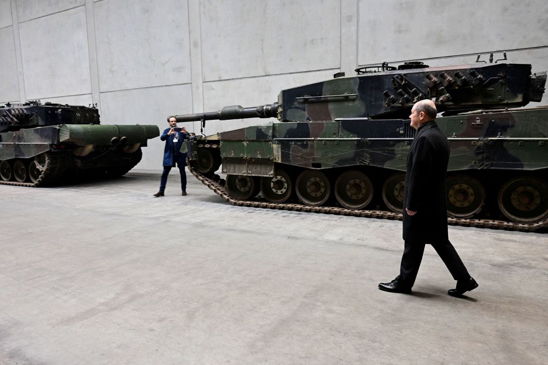 German Chancellor Olaf Scholz visits the future site of an arms factory where weapons maker Rheinmetall plans to produce munitions from 2025, in Unterluess, Germany, on February 12, 2024.