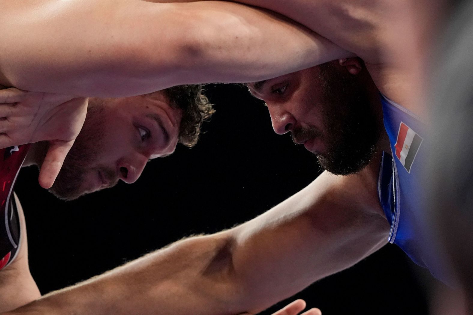 Turkey's Hamza Bak?r, left, competes against Egypt's Abdellatif Mohamed during a Greco-Roman wrestling match on August 5.