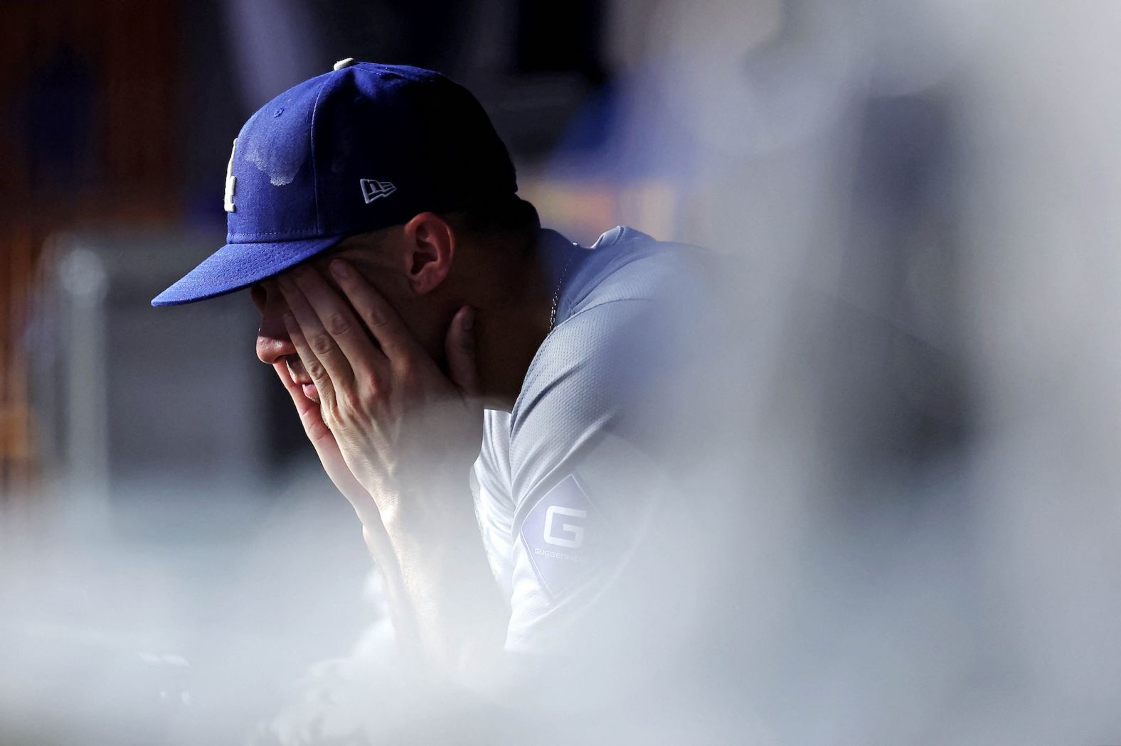 Dodgers pitcher Jack Flaherty reacts in the dugout after he was relieved in the second inning down 4-0.