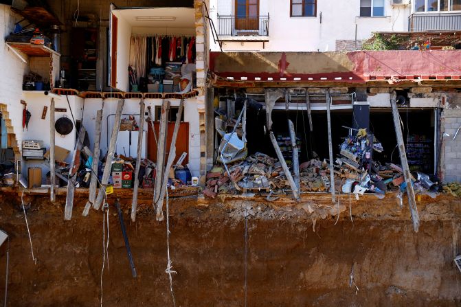 Belongings are seen inside damaged buildings in Chiva on Saturday.