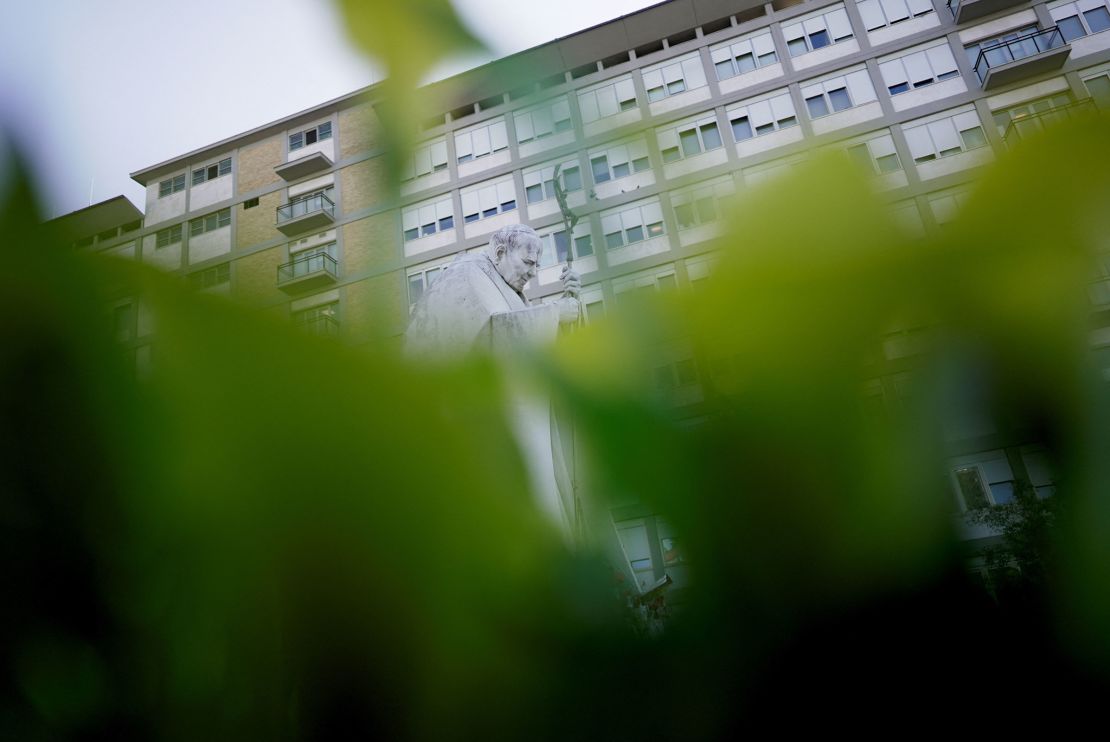 A statue of the late Pope John Paul II outside the Gemelli Hospital, where Pope Francis is undergoing treatment, in Rome, Italy, on March 7.