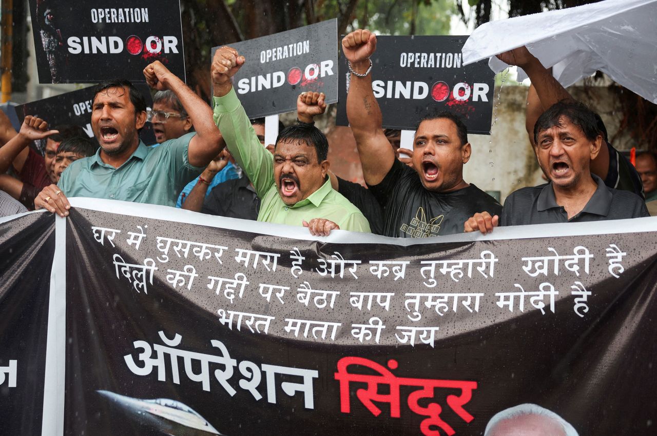 People celebrate India's strikes on Pakistan, in Ahmedabad, India.