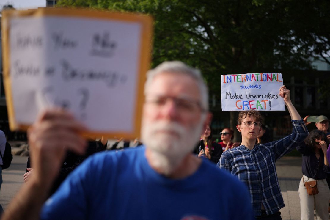 People participate in a "Harvard Stand United" rally in support of the school's international students on Tuesday.