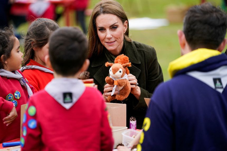 Catherine, Princess of Wales interacts with children, who are a part of the Scouts division